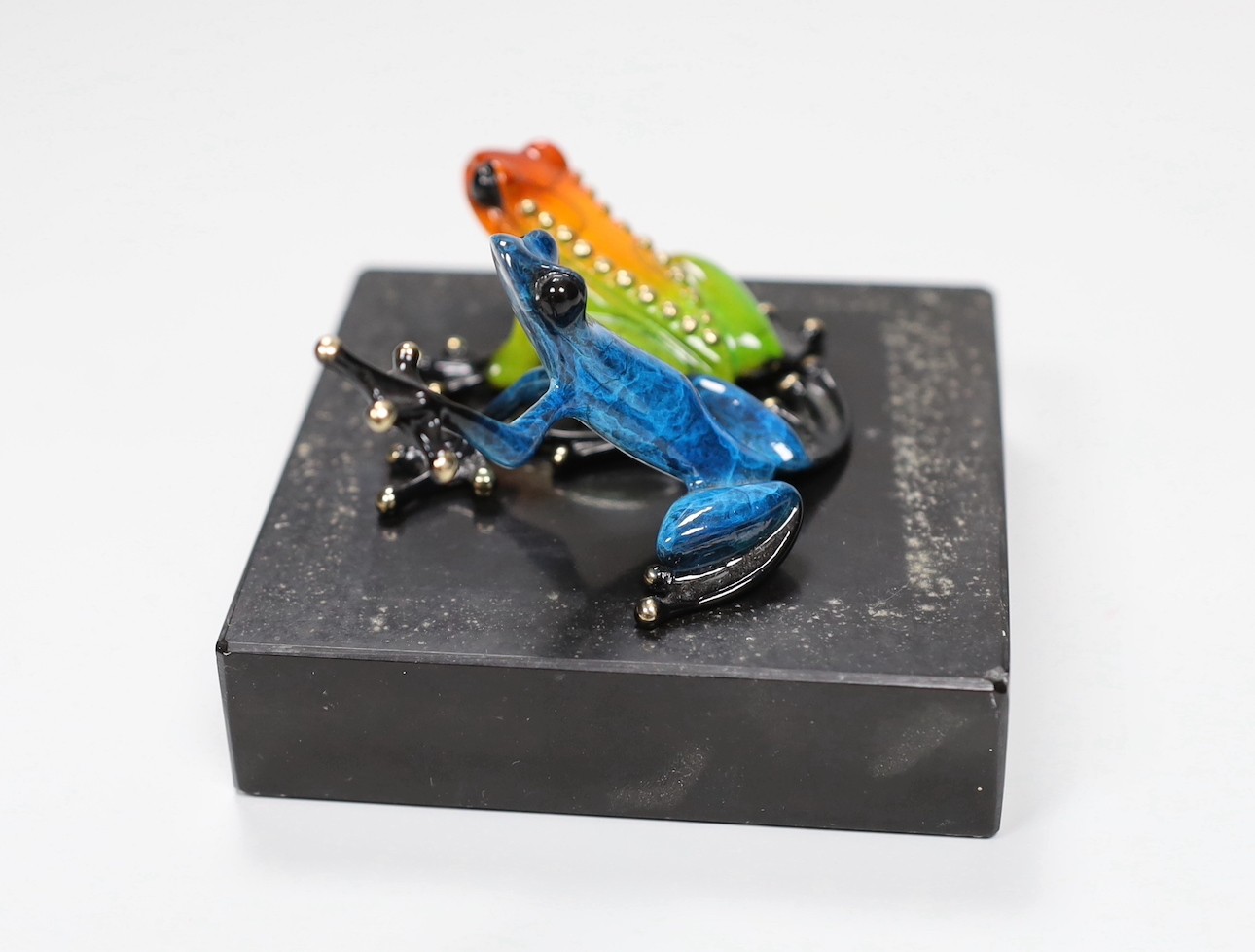 Tim Cotterill (Frogman) two small limited edition enamelled bronze frogs, ‘Meadow’ 1331/5000 with certificate of authenticity and another 3303/5000 without certificate of authenticity. Tallest 5cm